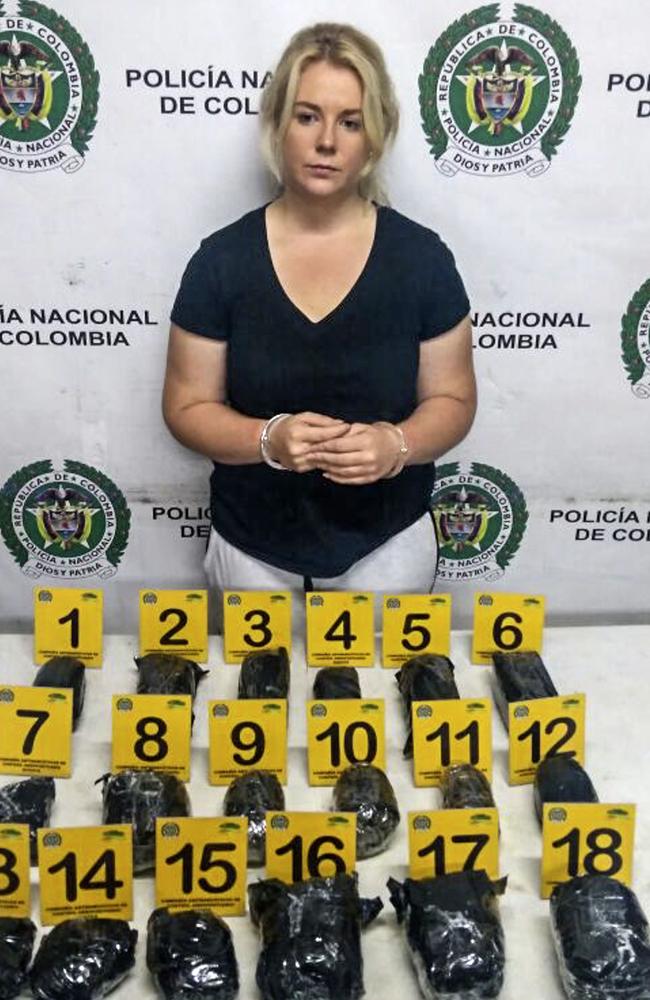 Sainbury pictured with the drugs found in her suitcase. Picture: AFP/Colombia Anti-Narcotics Police