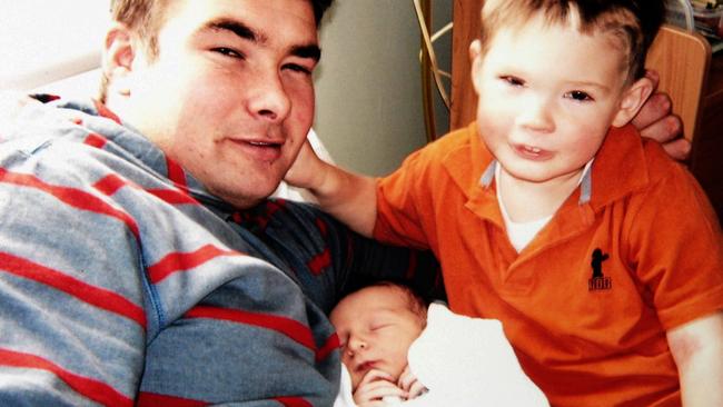 Shane O'Neill with sons Riley after the birth of Travis.