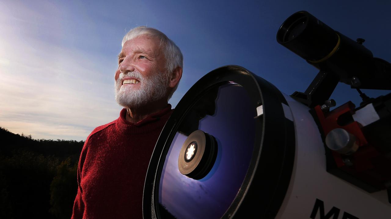 Shevill Mathers looks to the sky from his home observatory.