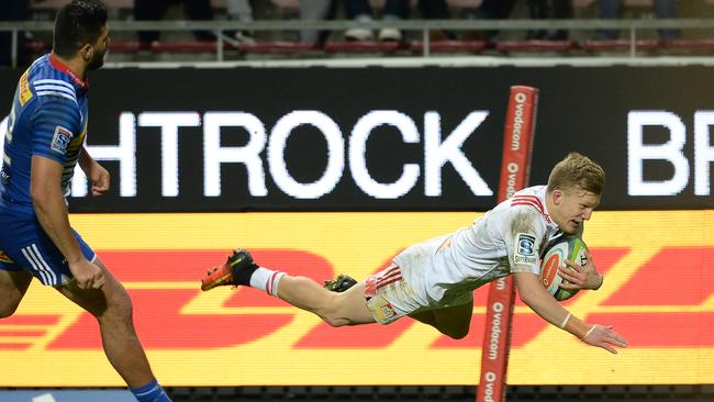Damian McKenzie of the Chiefs scores a try in Cape Town.