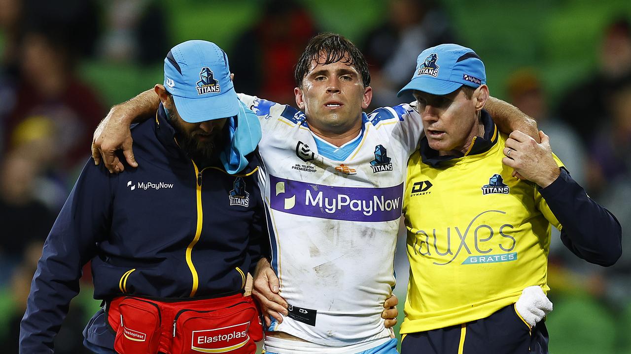 Aaron Booth of the Titans leaves the field. Photo by Daniel Pockett/Getty Images