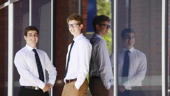 Michael Penklis and Mac Herring pose at Anglican Church Grammar School in East Brisbane on Friday, February 15, 2019. The boys received high scores in their OP results. (AAP Image/Claudia Baxter)