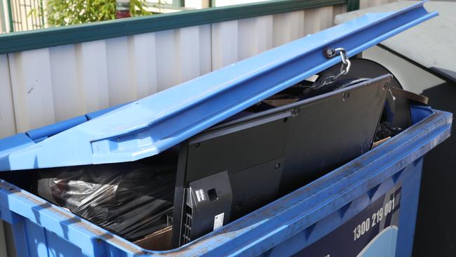 A TV in a bin the Footscray residence. Picture: David Crosling