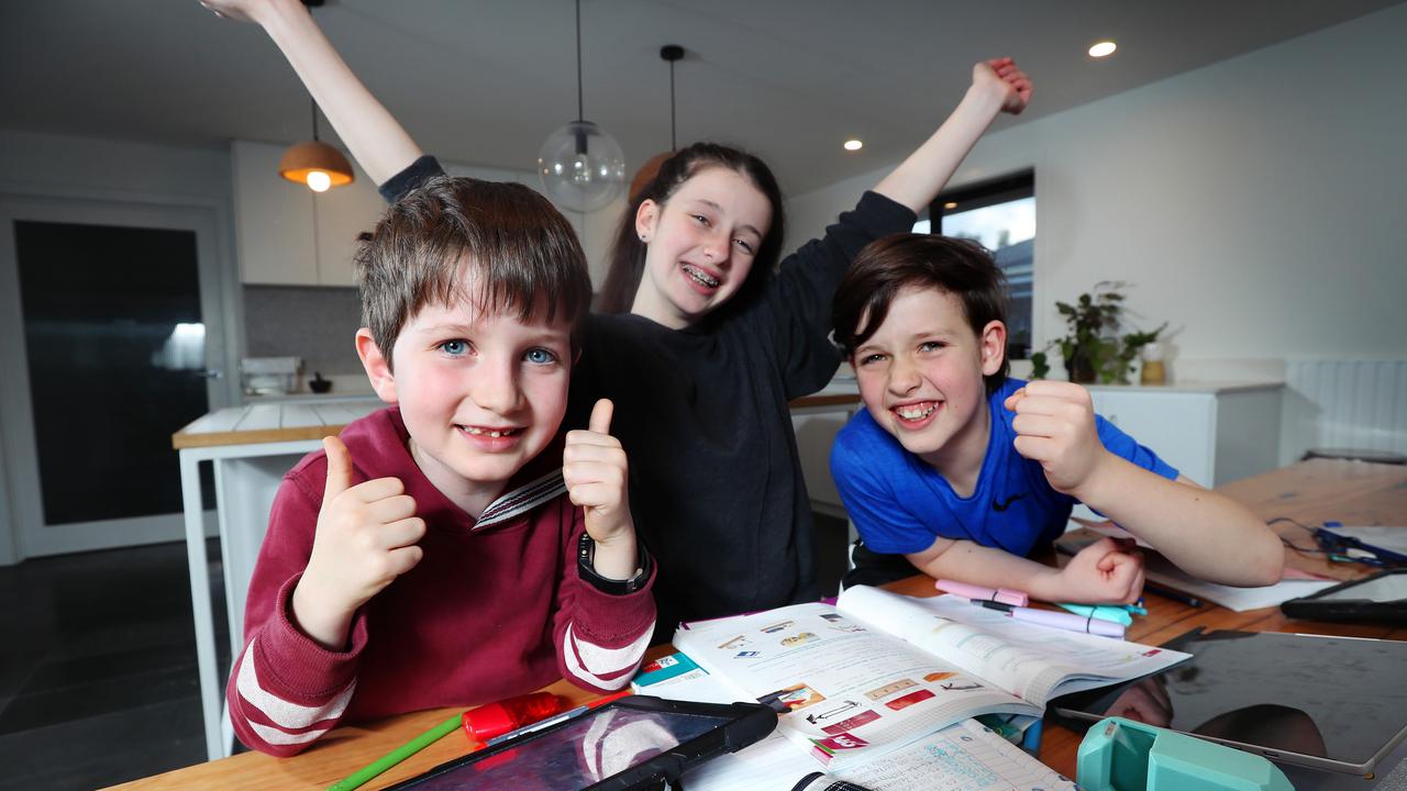 Their Blackburn North home often doubling as school, Jude, 6, Jasmine, 13, and Elijah, 10, are happy with Victoria’s NAPLAN results. Picture: Rebecca Michael