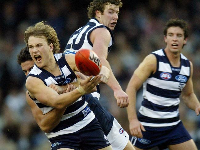 Gary Ablett gets a handball away against Carlton in 2004.