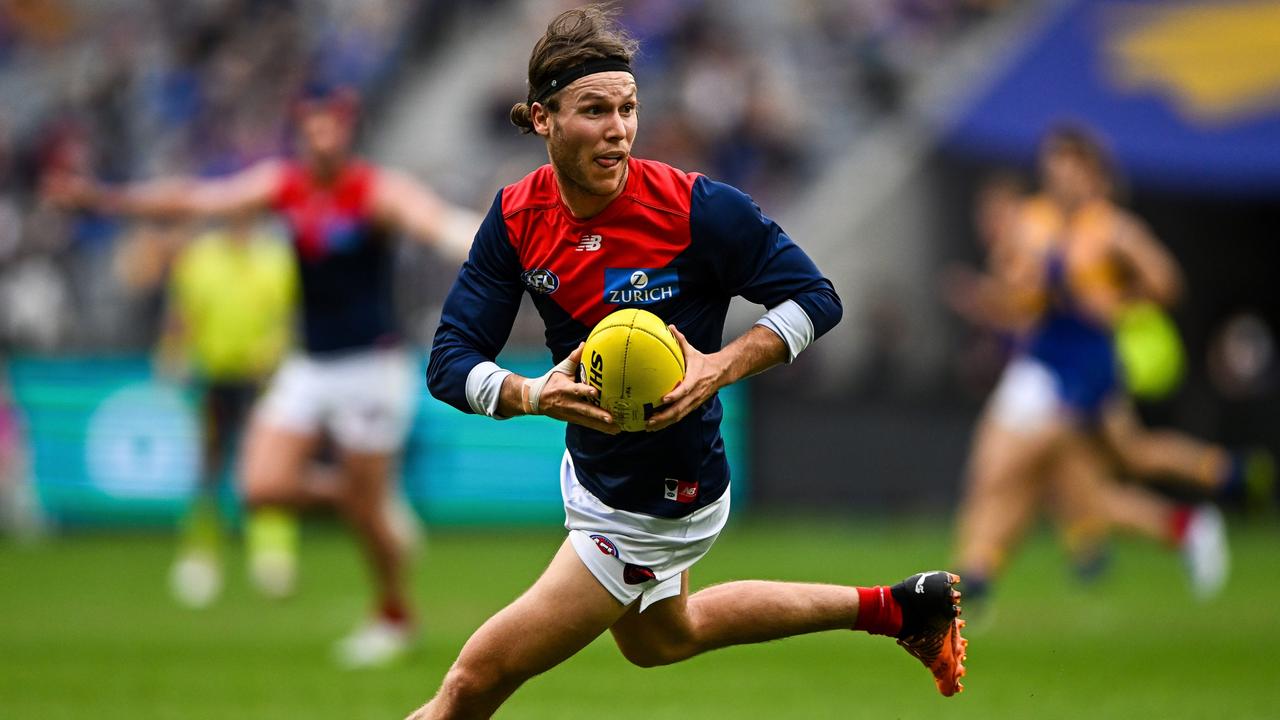 PERTH, AUSTRALIA - MAY 15: Ed Langdon of the Demons runs with the ball during the 2022 AFL Round 09 match between the West Coast Eagles and the Melbourne Demons at Optus Stadium on May 15, 2022 in Perth, Australia. (Photo by Daniel Carson/AFL Photos via Getty Images)