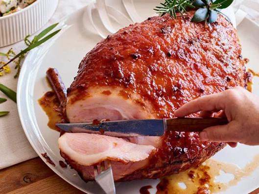 Spiced sticky peach-glazed ham.