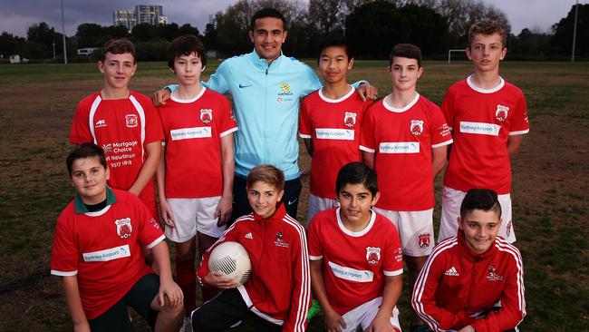 Socceroos star Tim Cahill with players from his junior club Marrickville FC at Mackey Park, Marrickville.