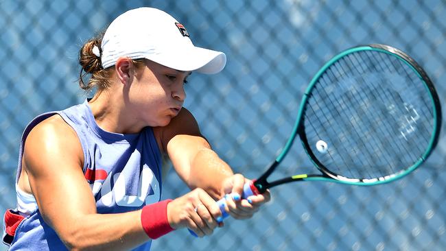 Cranky and lathered in sweat, Ash Barty battles through a training session. Picture: Getty Images