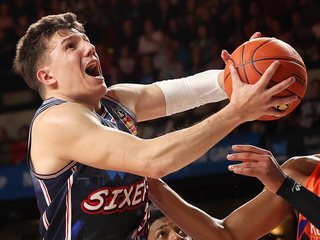 ADELAIDE, AUSTRALIA - DECEMBER 09: Dejan Vasiljevic of the 36ers and Bobi Klintman of the Cairns Taipans  during the round 10 NBL match between Adelaide 36ers and Cairns Taipans at Adelaide Entertainment Centre, on December 09, 2023, in Adelaide, Australia. (Photo by Sarah Reed/Getty Images)