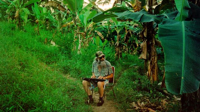 Ellis playing his synthesiser in Sumatra, while appearing in Ellis Park.