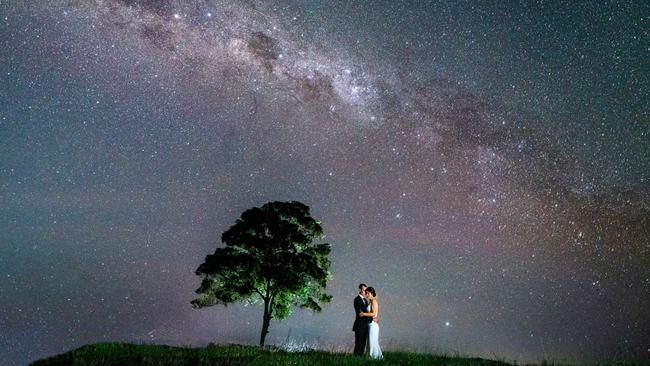 Mikaela and Paul Marino under the milky way at Kur-Cow Farm, Kuranda. Picture: Perspectives Photography