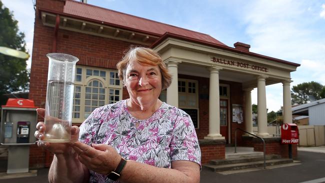 Merilyn Meadows, Ballan, with her rain gauge. Picture: Yuri Kouzmin