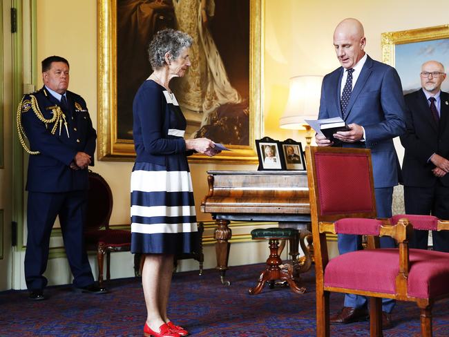 New Tasmanian Premier Peter Gutwein alongside Tasmanian Governor General Kate Warner as he is sworn in as the new Premier at Government House. Picture: ZAK SIMMONDS