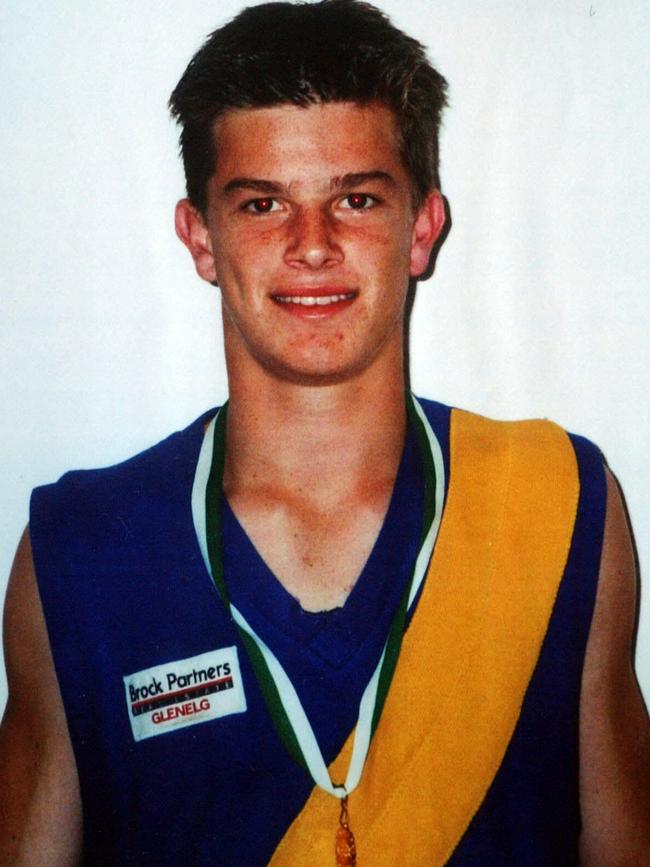 Chris wearing his medal after winning the 2002 Best and Fairest in the Under 17s at Glenelg.