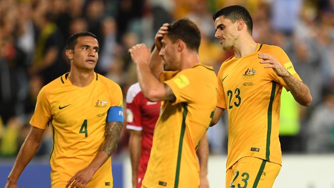 Tim Cahill, James Troisi and Tomas Rogic. (AAP Image/Dean Lewins)