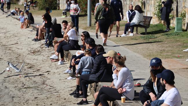 Despite lockdown, beachgoers turn out in droves at Double Bay in Sydney. Picture: NCA NewsWire / Nicholas Eagar