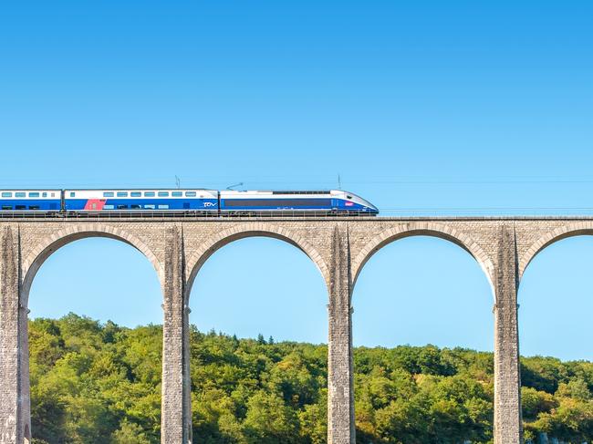 ESCAPE: EURAIL .. John Borthwick story ..  Cize, France - July 9, 2015: French high speed train TGV operated by SNCF, on Cize-Bolozon viaduct bridge in Ain, Rhone-Alpes region in France.   Picture: iStock