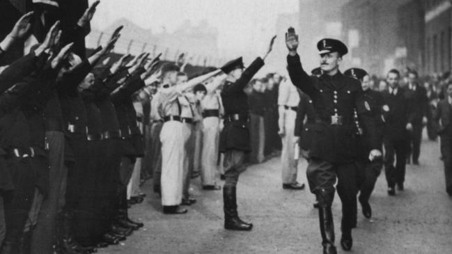 Fascist leader Oswald Mosley inspecting members of the British Union of Fascists outside the Royal Mint in London, 1935.