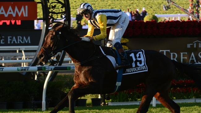 Jockey Leith Innes rides Provocative to win the final race at Eagle Farm. Picture: AAP