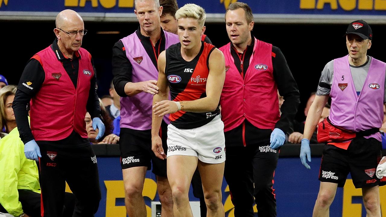 Matt Guelfi was taken to hospital for scans after colliding with the fence at Perth Stadium. Picture: Getty