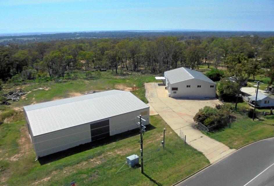 This industrial property at Kenilworth St boasts a huge floor space and backs onto Morgan Park Raceway. Picture: realcommercial.com.au