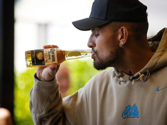 Nick Kyrgios cracks a beer three days before the start of the Australian Open. Picture: Mark Stewart