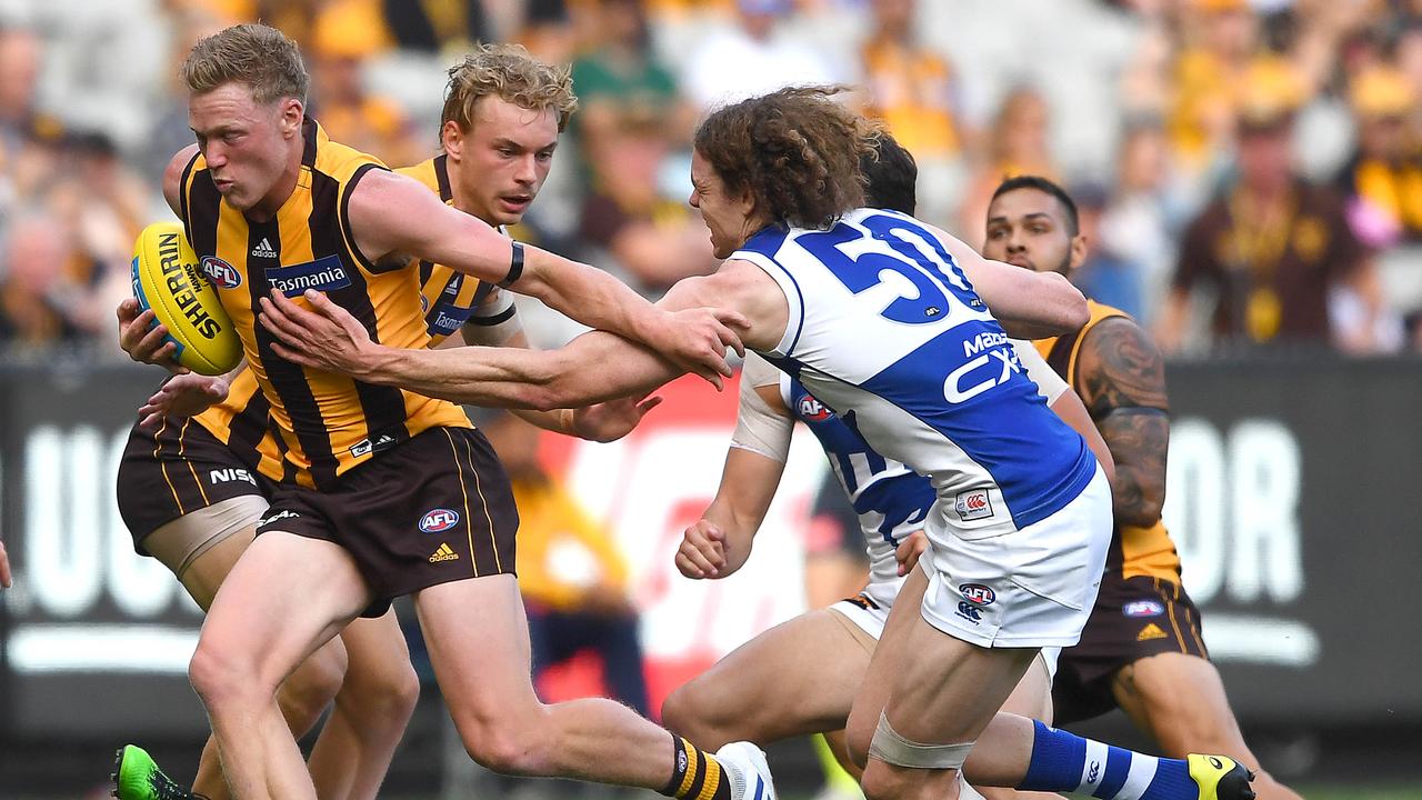 Ben Brown attempts a tackle in North Melbourne’s Round 3 match. Photo: Quinn Rooney/Getty Images.