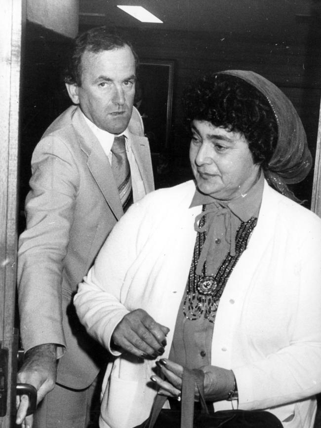 St Kilda's general manager Ian Stewart escorts Aboriginal Advancement worker Aunty Mollie Dyer in 1984 into the VFL Tribunal. Neg: 840507/96