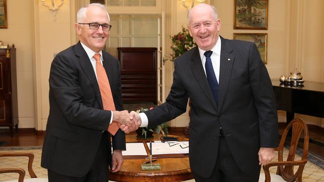 Malcolm Turnbull with Sir Peter Cosgrove during a swearing-in ceremony at Government House Picture: Gary Ramage.