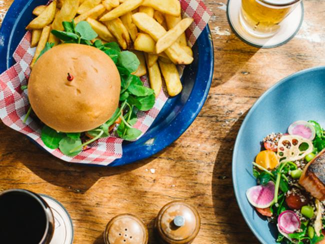 The Glenmore Hotel, known for its sun-drenched rooftop which has sweeping 180 degree views of Sydney Harbour and the CBD, has a range of burgers on offer. Picture: Facebook