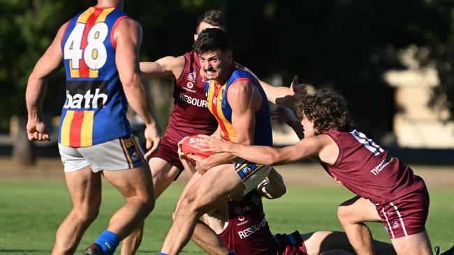 Jared Centenera with the ball during Old Ignatians’ opening round clash against Prince Alfred OC last season. The club will remain in division one for season 2023. Picture: Morgan Sette