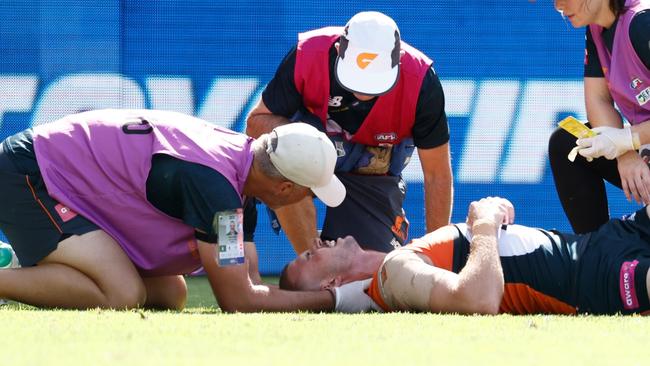 SYDNEY, AUSTRALIA - MARCH 09: Kieren Briggs of the Giants is seen injured during the 2025 AFL Opening Round match between the GWS Giants and the Collingwood Magpies at ENGIE Stadium on March 9, 2025 in Sydney, Australia. (Photo by Michael Willson/AFL Photos via Getty Images)