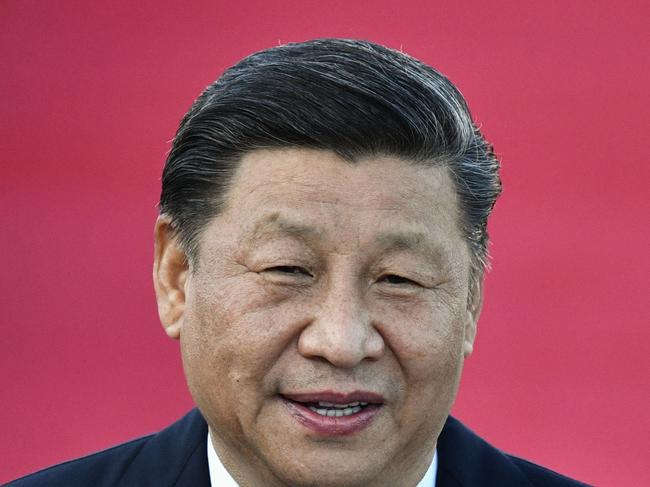 China's President Xi Jinping speaks upon his arrival at Macau's international airport in Macau on December 18, 2019, ahead of celebrations for the 20th anniversary of the handover from Portugal to China. - Chinese president Xi Jinping landed in Macau on December 18 as the city prepares to mark 20 years since the former Portuguese colony was returned, a celebration that stands in stark contrast to months of unrest in neighbouring Hong Kong. (Photo by Anthony WALLACE / AFP)