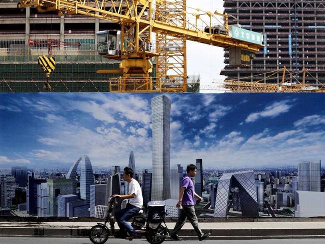 Beijing wants to keep its economy moving and open up opportunities for Chinese citizens living overseas. Picture: AP