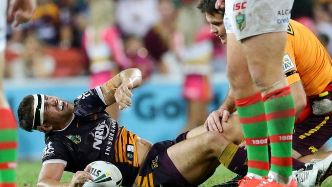 Andrew McCullough goes down with a knee injury. Pic Darren England.