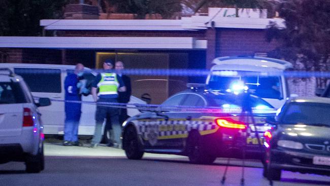 Homicide squad detectives at the scene. Picture Jay Town