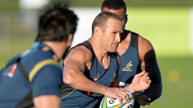 Matt Giteau takes on the defence during a Wallabies training session at Sunshine Coast Stadium.