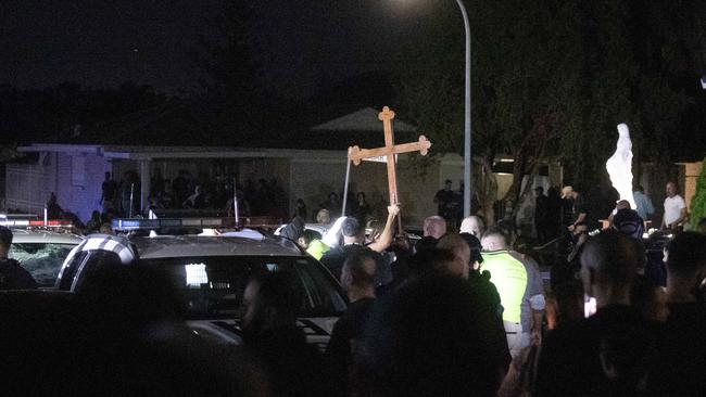 The wild scenes where a mob took part in a riot outside the Wakeley church. Picture: Liam Mendes