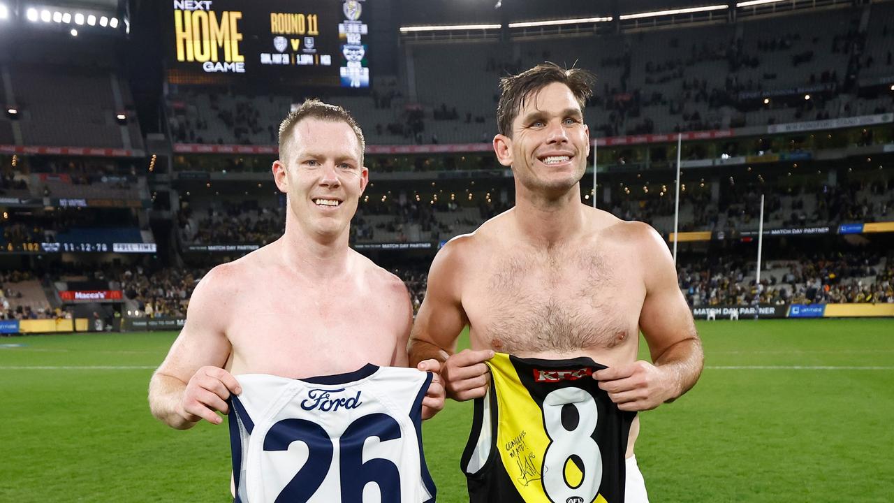 MELBOURNE, AUSTRALIA – MAY 12: Jack Riewoldt of the Tigers and Tom Hawkins of the Cats swap jumpers after the 2023 AFL Round 09 match between the Richmond Tigers and the Geelong Cats at the Melbourne Cricket Ground on May 12, 2023 in Melbourne, Australia. (Photo by Michael Willson/AFL Photos via Getty Images)