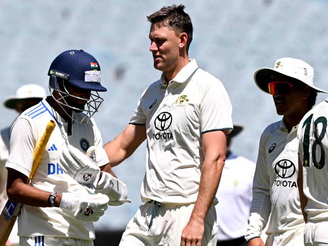 Australian bowler Beau Webster (3/R) celebrates with teammates after dismissing Indian batsman Mukesh Kumar (C) during the Australia A against India A cricket match at the Melbourne Cricket Ground (MCG) in Melbourne on November 7, 2024. (Photo by William WEST / AFP) / --IMAGE RESTRICTED TO EDITORIAL USE - STRICTLY NO COMMERCIAL USE--