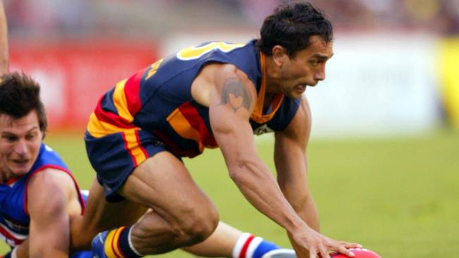 Former Crow Andrew McLeod in action in 2006 against the Western Bulldogs.