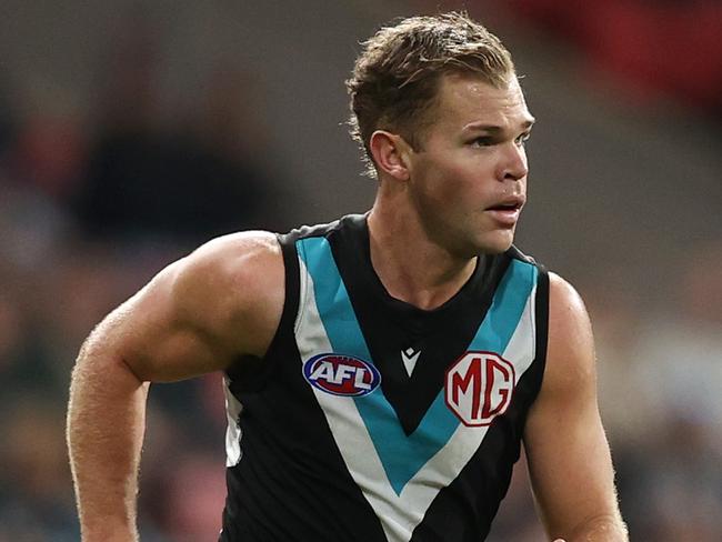 SYDNEY, AUSTRALIA - JUNE 16: Dan Houston of the Power in action during the round 14 AFL match between Greater Western Sydney Giants and Port Adelaide Power at ENGIE Stadium on June 16, 2024 in Sydney, Australia. (Photo by Jason McCawley/AFL Photos/via Getty Images)