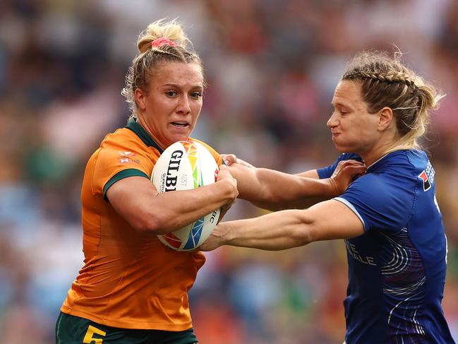 SYDNEY, AUSTRALIA - JANUARY 28: Teagan Levi of Australia is tackled during the 2023 Sydney Sevens match between Australia and France at Allianz Stadium on January 28, 2023 in Sydney, Australia. (Photo by Matt King/Getty Images)