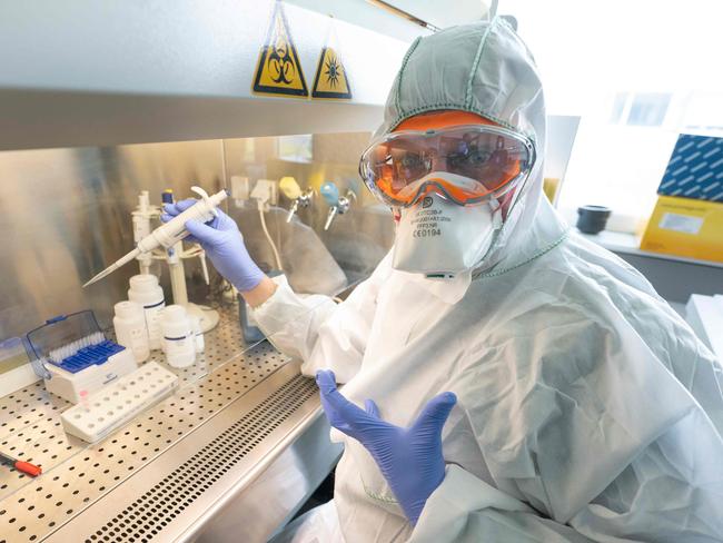 CORRECTION - Molecular biologist William Dundon runs a test to detect whether a person has been infected with COVID-19, at the IAEA's Laboratories in Seibersdorf, Austria, on May 7, 2020. - Shortages of materials needed in tests for the novel coronavirus continue to be "critical", according to the head of a UN lab, which is supplying countries with COVID-19 detection tests. (Photo by JOE KLAMAR / AFP) / “The erroneous mention[s] appearing in the metadata of this photo by JOE KLAMAR has been modified in AFP systems in the following manner: [Molecular biologist William Dundon] instead of [Giovanni Cattoli, head of the joint FAO/IAEA Animal Production and Health Laboratory]. Please immediately remove the erroneous mention[s] from all your online services and delete it (them) from your servers. If you have been authorized by AFP to distribute it (them) to third parties, please ensure that the same actions are carried out by them. Failure to promptly comply with these instructions will entail liability on your part for any continued or post notification usage. Therefore we thank you very much for all your attention and prompt action. We are sorry for the inconvenience this notification may cause and remain at your disposal for any further information you may require.”