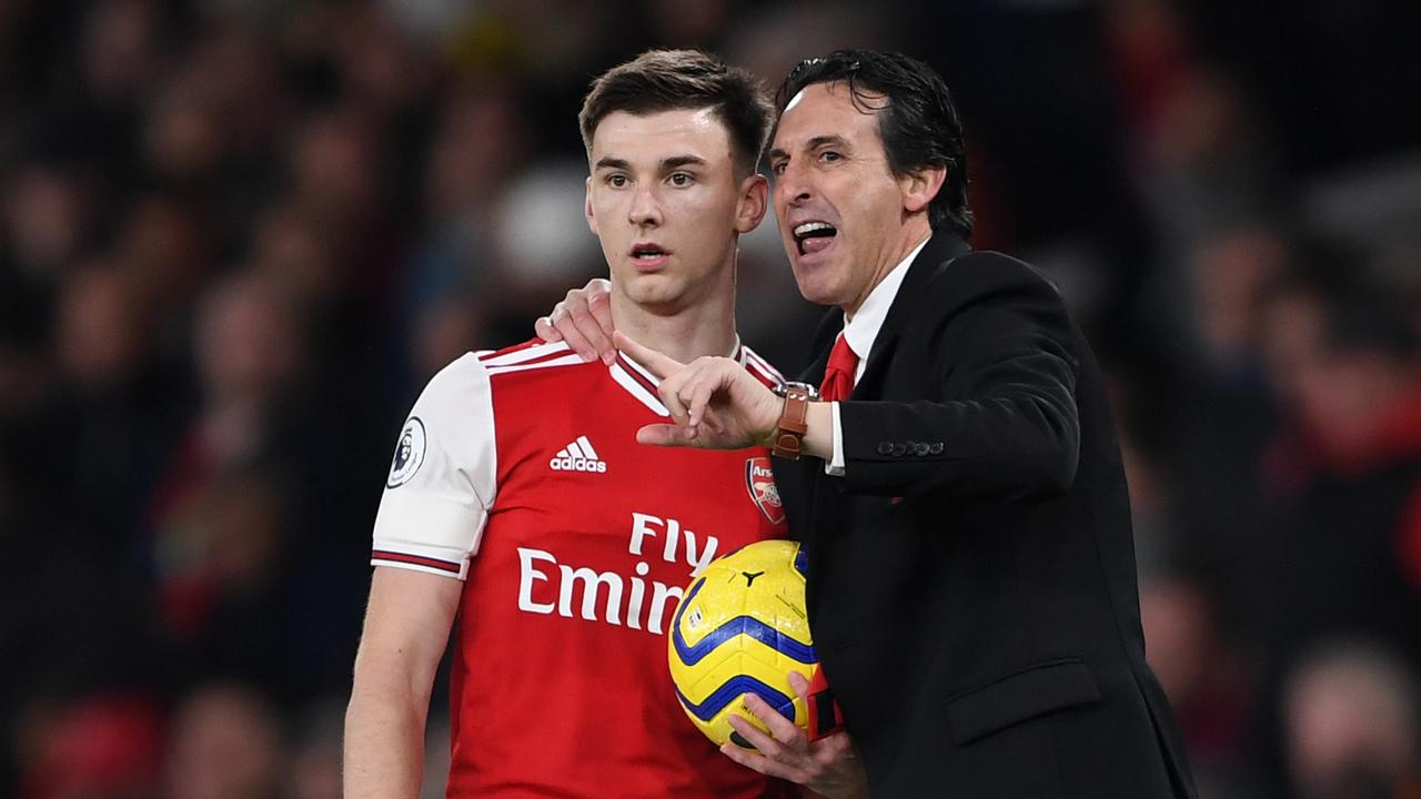 Sacked boss Unai Emery with Kieran Tierney.