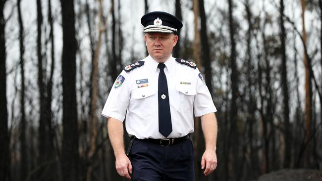 Rural Fire Service Commissioner Shane Fitzsimmons inspects the fire ground. Picture: Peter Lorimer