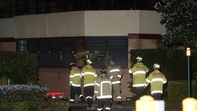 Fire crews at the unit complex last night. Picture: Bill Hearne