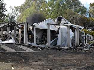 ABOVE: The remains of a 127-year-old house shows the devastation that followed from a fire at Pie Creek on Monday. Picture: Frances Klein