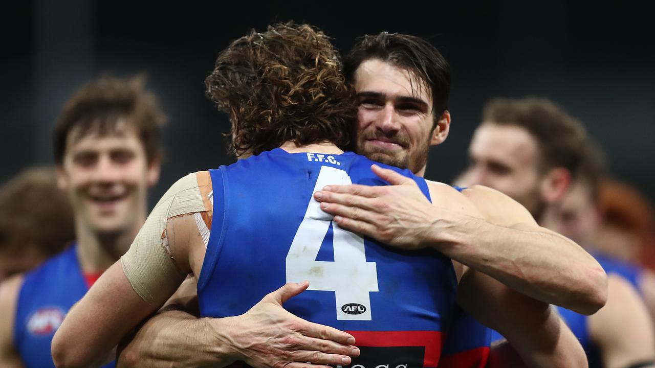 Easton Wood and Marcus Bontempelli embrace after a game in 2019.